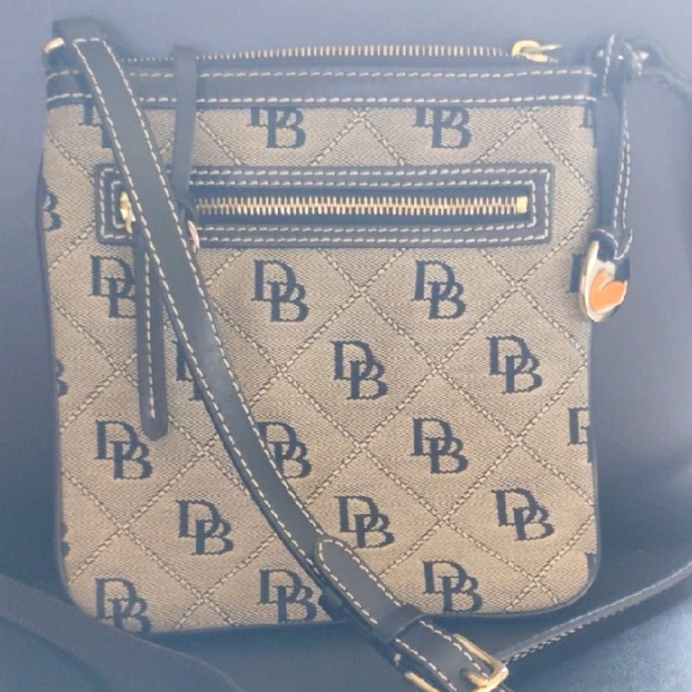 Dooney & Bourke Black and Tan Crossbody Bag with Signature Style